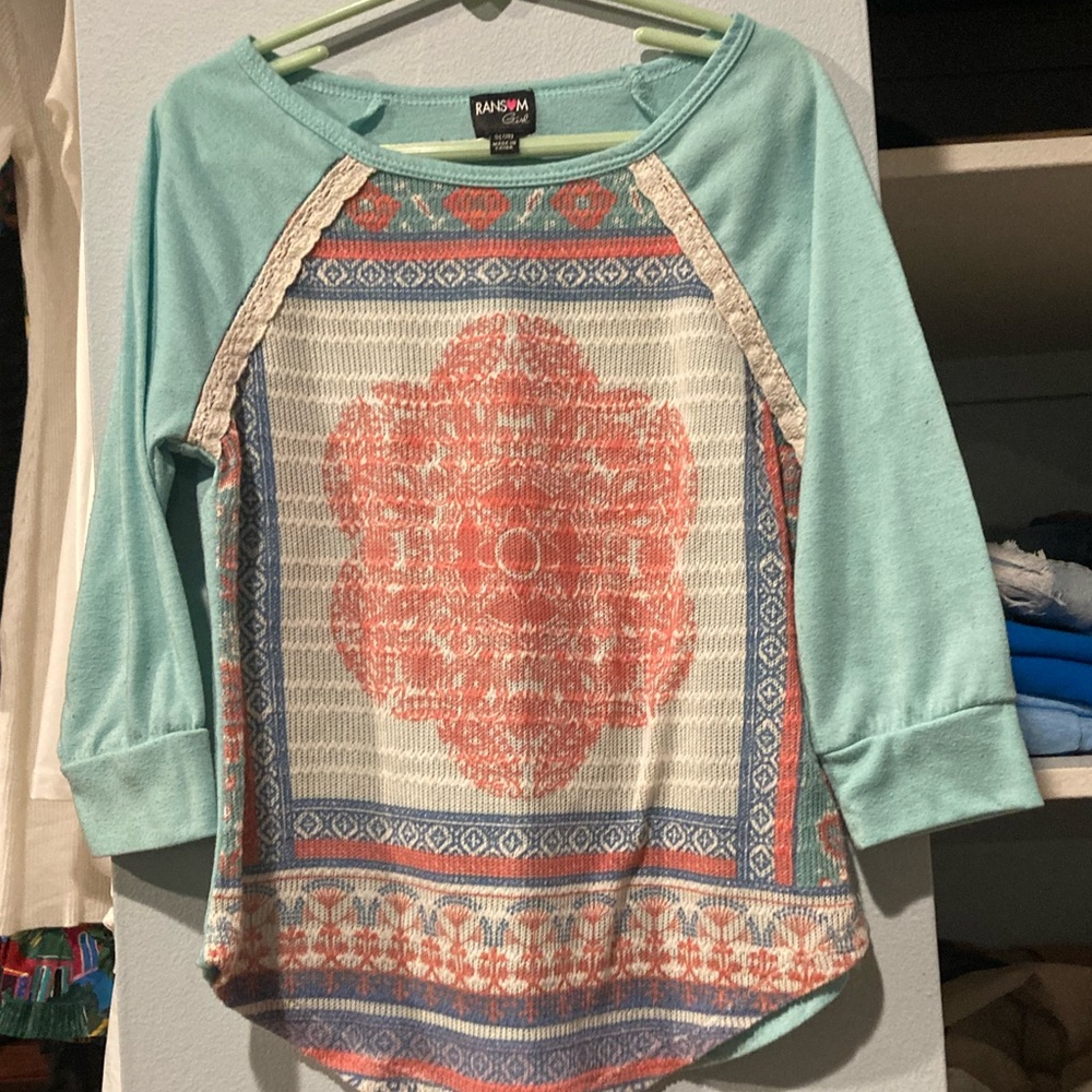 A long/ short sleeve shirt it has been worn once and the size is 7-8